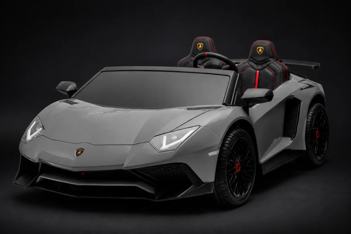 Grey Lamborghini ride-on supercar, photographed from the front three-quarter angle